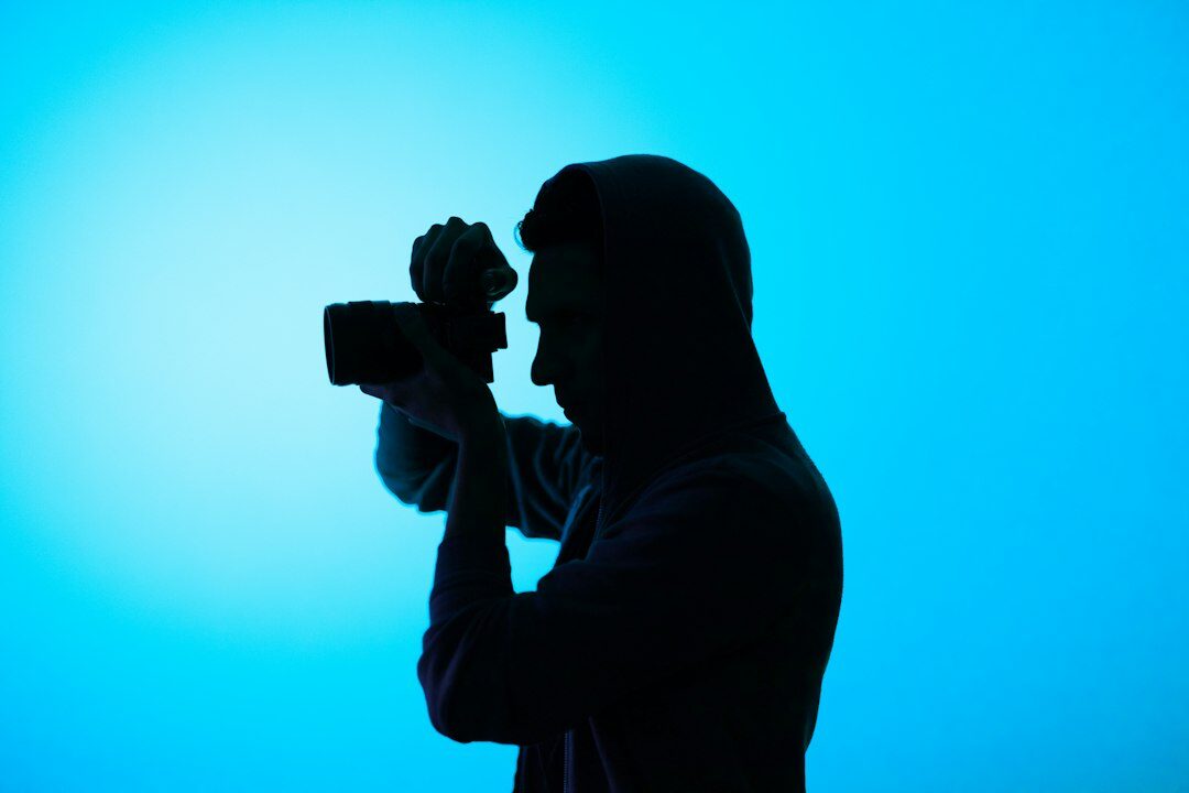 Studio portrait of a male camera operator